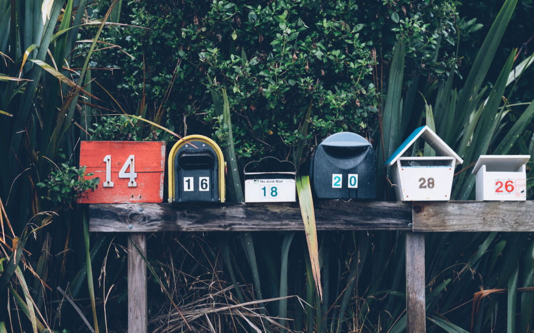 roailboxes photo by Mathyas Kurmann on Unsplash representing creative ways to build community with neighbors
